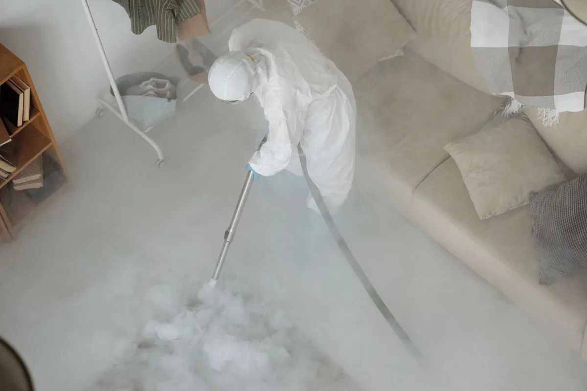 Biohazard cleanup technician in protective equipment, Dover Shores East, Orlando, FL